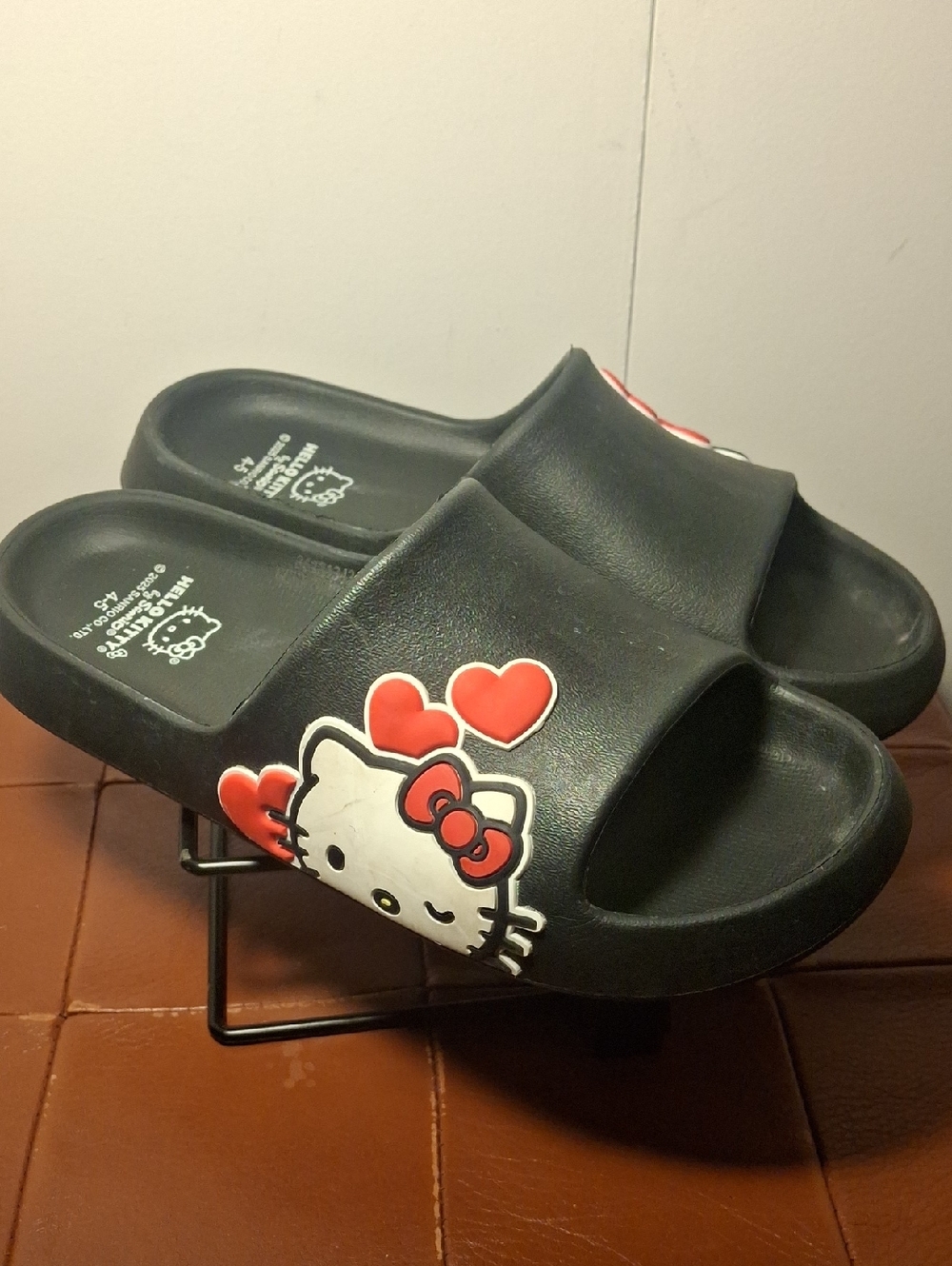 Hello Kitty Kids' Black Slide Sandals with Red Heart Accents